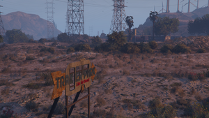 SenoraDesertTrailerPark-GTAVe-DirectionSign.png