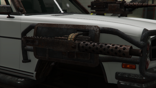 장착된 .50 구경 기관총 (녹슨, 오른쪽) 클로즈업.