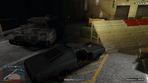 Resupply-GTAO-RhinoTank-StealSuppliesFortZancudo.PNG