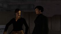 S.A.M. 임무 중 아스카 카센과 마리아 라토레가 미겔을 고문하는 모습.