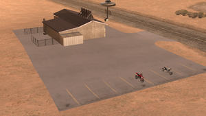 LilProbeInn-GTASA-ParkingLot.png