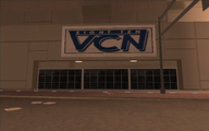 건물에서 볼 수 있는 '에이트-텐 VCN' 로고.