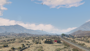 BusinessBattles-MerryweatherDrop-GTAOe-SandyShores-CargoDroppingIn.png