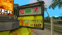 《Grand Theft Auto: Vice City》 내 초기 '스쿼트' 로고를 사용하는 칼레기 델리카트슨 레스토랑 외관 간판.