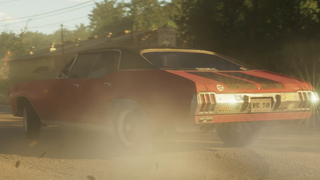 후면 쿼터 뷰, 차량의 범퍼 스티커를 보여줍니다.