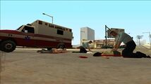 GTA San Andreas에서 두 명의 보행자를 소생시키는 라스 벤츄라스 구급대원(파란색 유니폼).