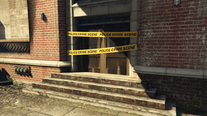 DarnellBrosGarmentFactory-GTAVe-Torched-Entrance.png