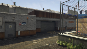 PremiumDeluxeMotorsport-GTAV-BackEntrance.png